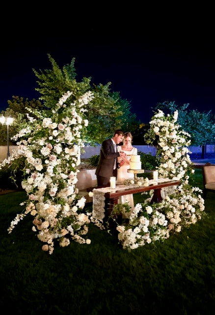 emrie-wedding-arch-cake-couple