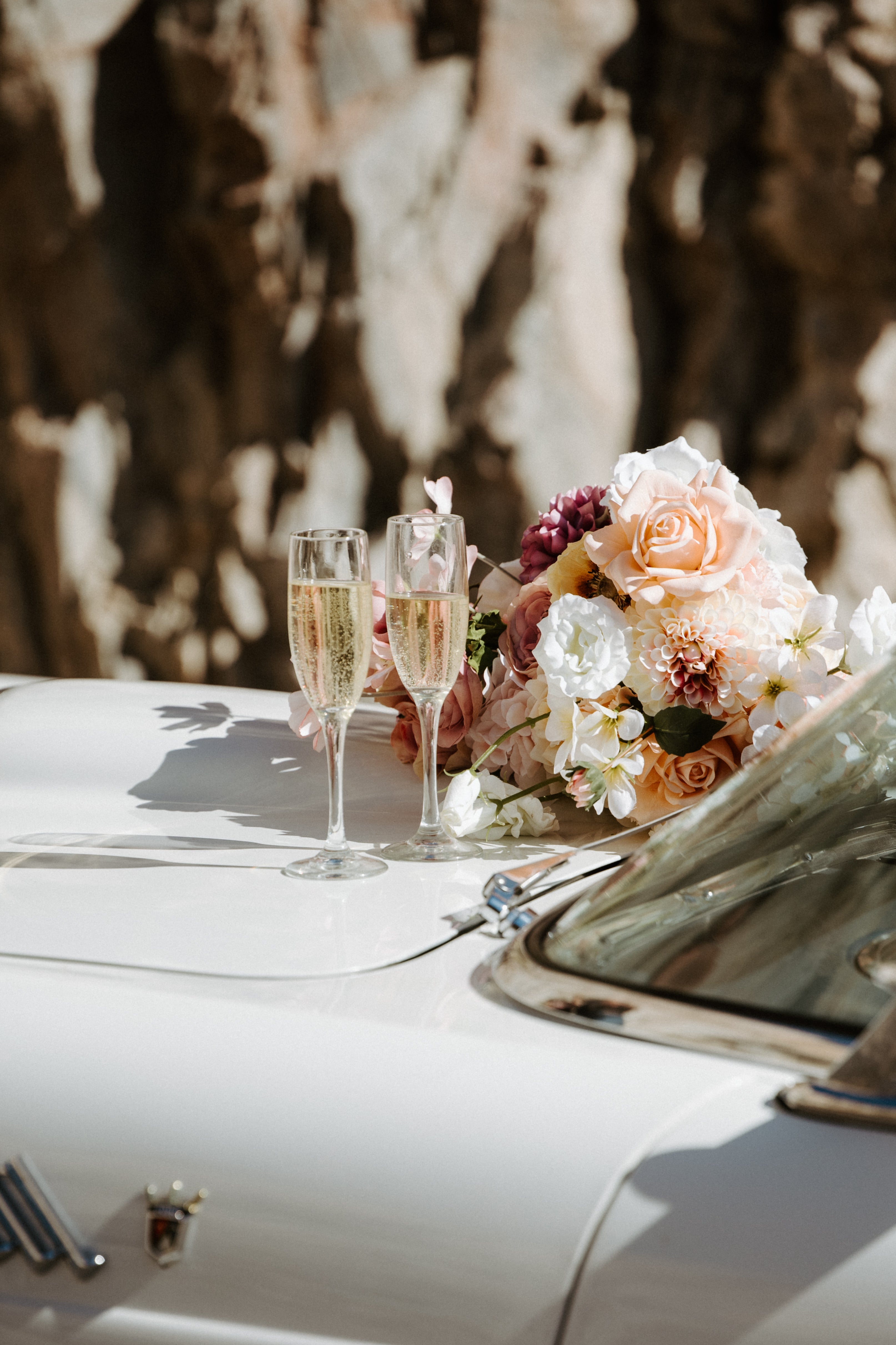 Two wine glasses and flowers