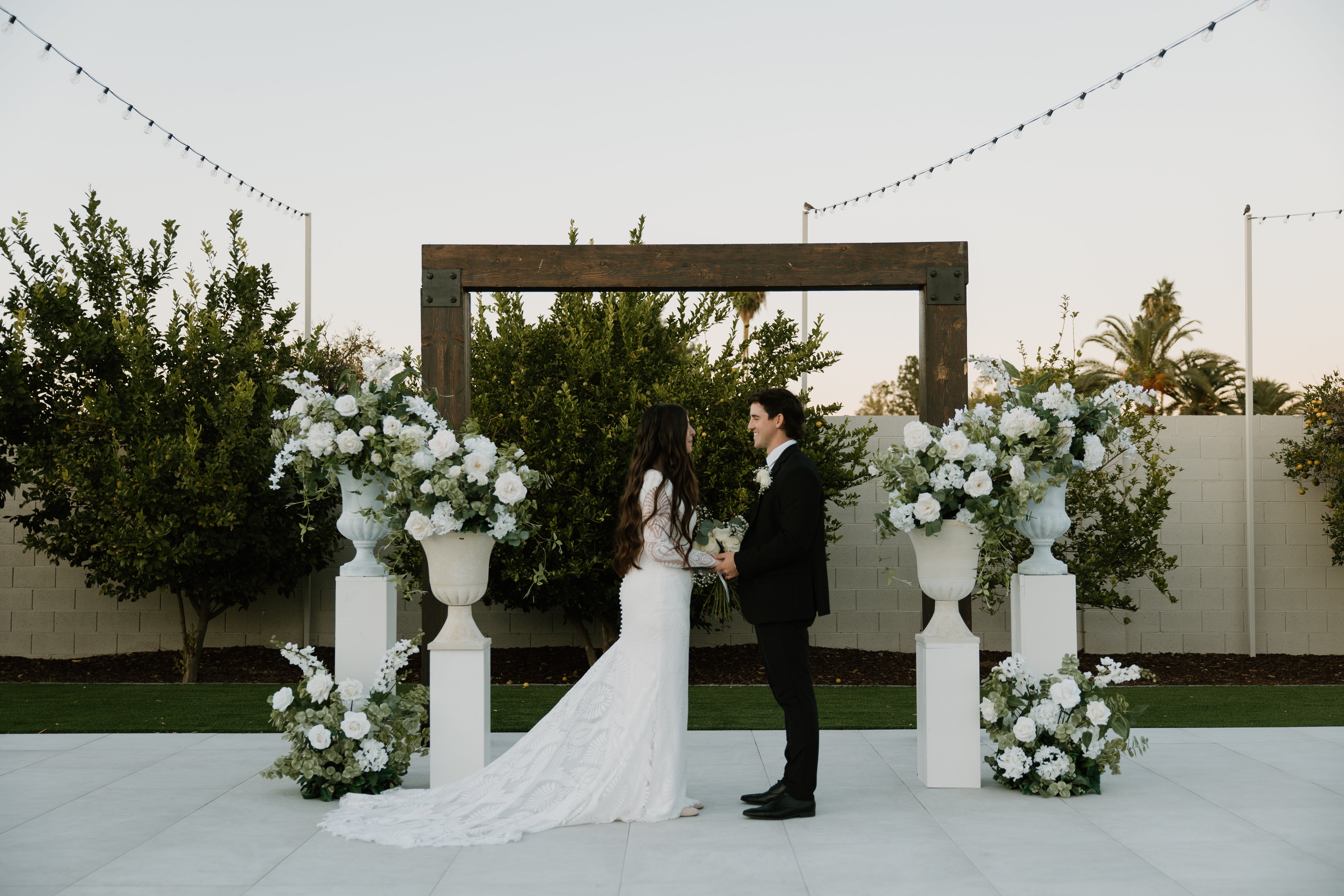 garden-floral-urns-couple