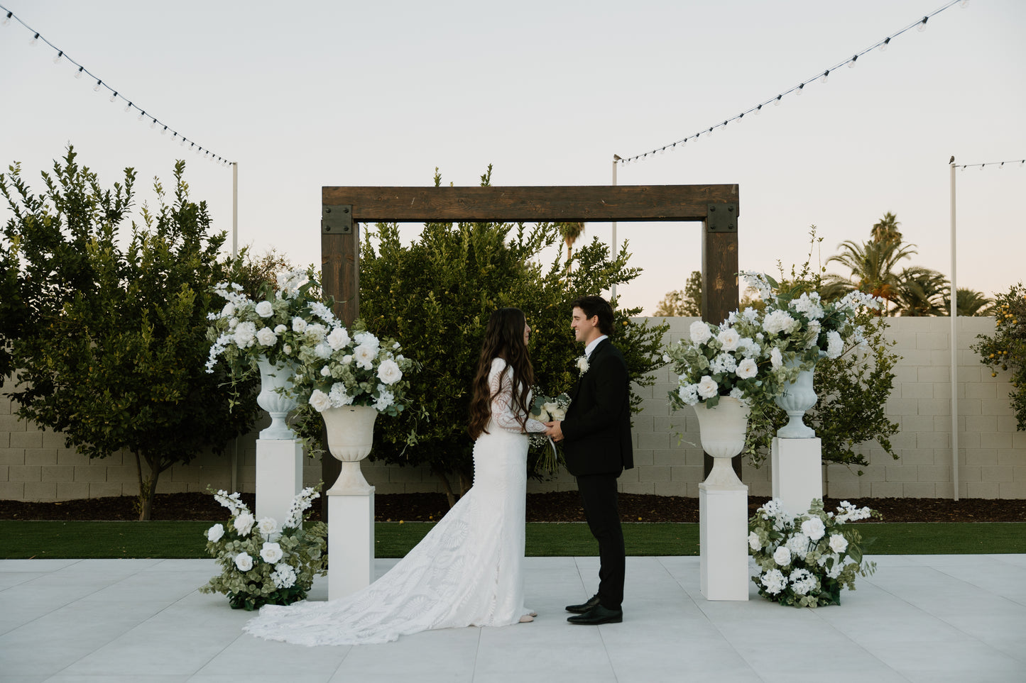 garden-floral-urns-couple