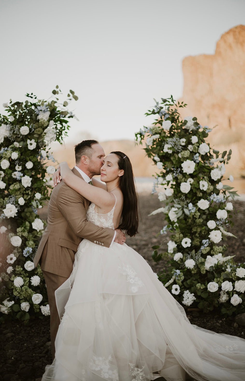 kylee-wedding-arch-by-river-couple