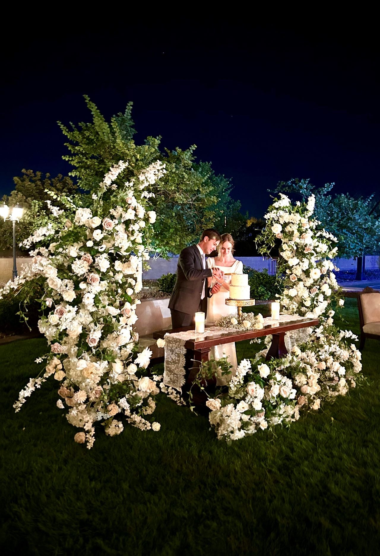 Decorative Wooden Arche and Wedding couple