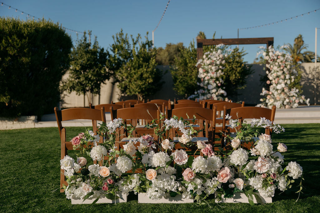 ella-aisle-flowers-gather-estates-with-chairs